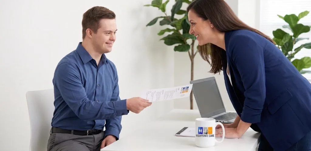 Job candidate presenting resume during employer interview